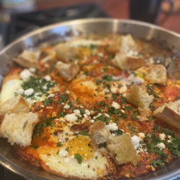 Shakshuka with Swiss Chard, Feta & Rustic French Bread by Chef Kai Chase