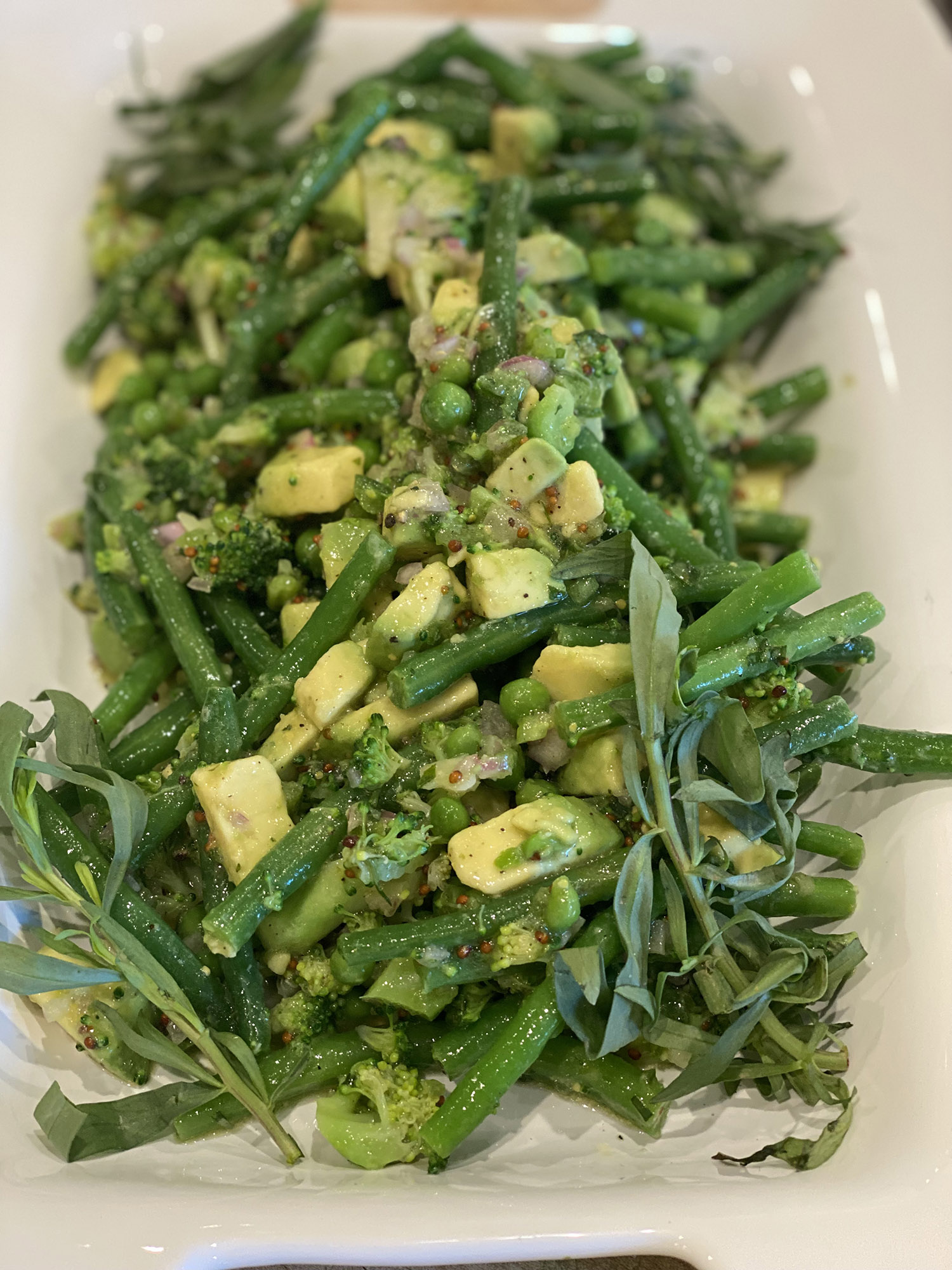 Spring Greens Salad with Avocado, Early Peas and Tarragon-Dijon Vinaigrette by Chef Kai Chase